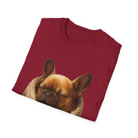 Folded maroon t-shirt with a dog graphic on a white background
