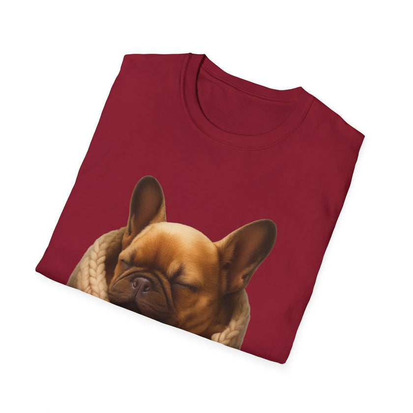Folded maroon t-shirt with a dog graphic on a white background