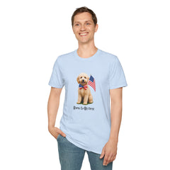 Male wearing T-shirt featuring a cute golden doodle puppy wearing an American flag bow tie and holding a small U.S. flag, with the phrase 'Born to Be Free' printed below the image.