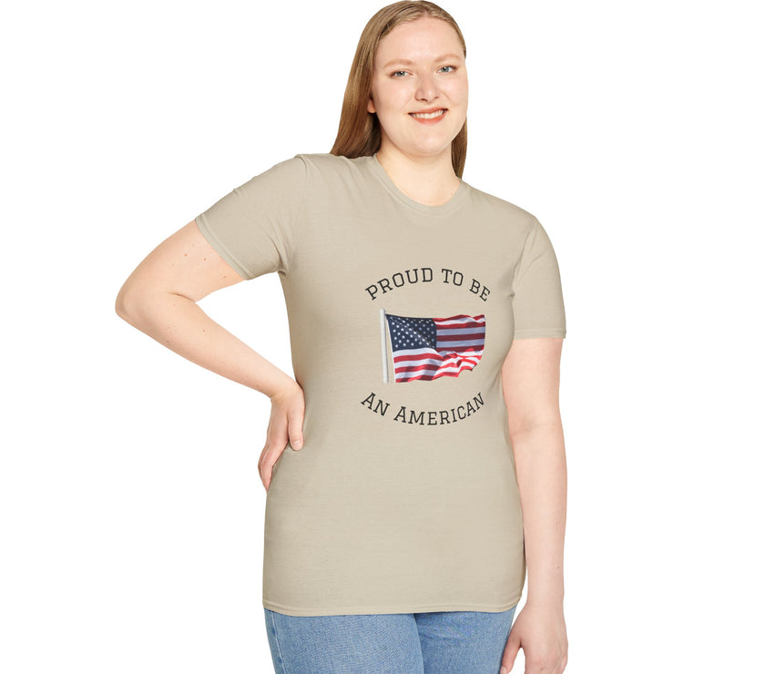 Smiling woman  wearing a white t-shirt with an American flag graphic and the words 'Proud to Be an American' printed around the flag