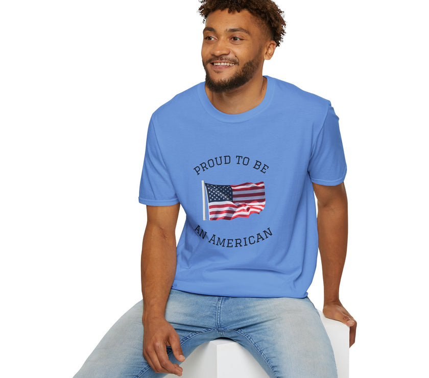 Young man  wearing a white t-shirt with an American flag graphic and the words 'Proud to Be an American' printed around the flag
