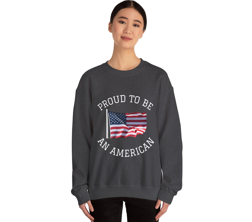 Person wearing a dark gray sweatshirt with 'Proud to be an American' text and an American flag design on a white background.