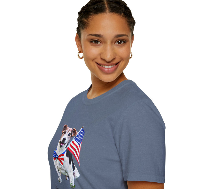 Female wearing T-shirt featuring a cute  puppy wearing an American flag bow tie and holding a small U.S. flag, with the phrase 'Born to Be Free' printed below the image.