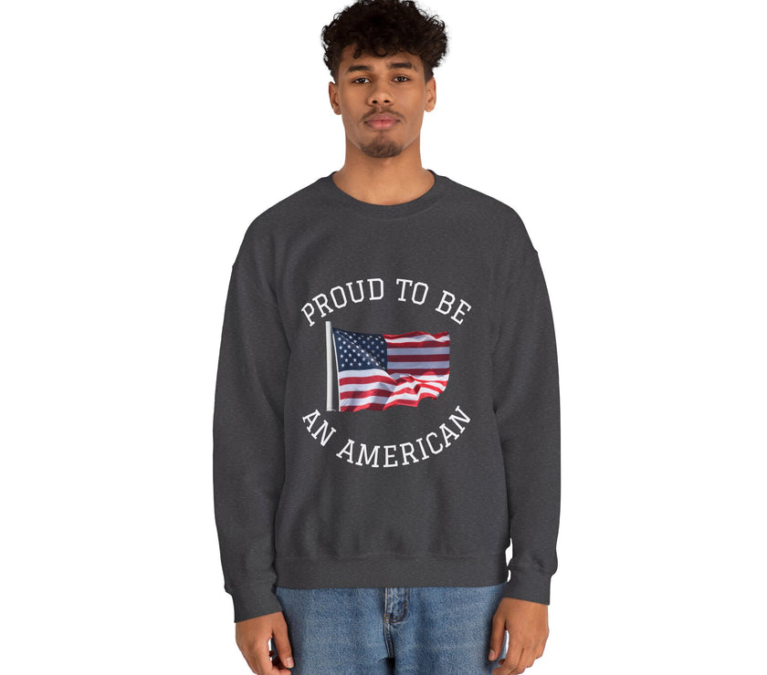 Person wearing a dark gray sweatshirt with 'Proud to be an American' text and an American flag graphic on a white background.