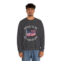 Person wearing a dark gray sweatshirt with 'Proud to be an American' text and an American flag graphic on a white background.