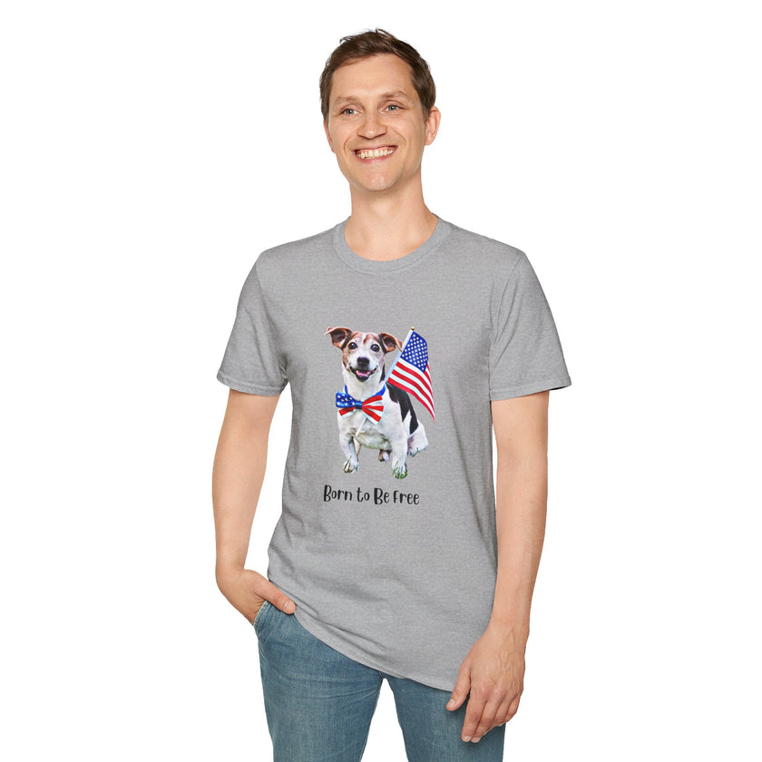 Male wearing T-shirt featuring a cute golden doodle puppy wearing an American flag bow tie and holding a small U.S. flag, with the phrase 'Born to Be Free' printed below the image.