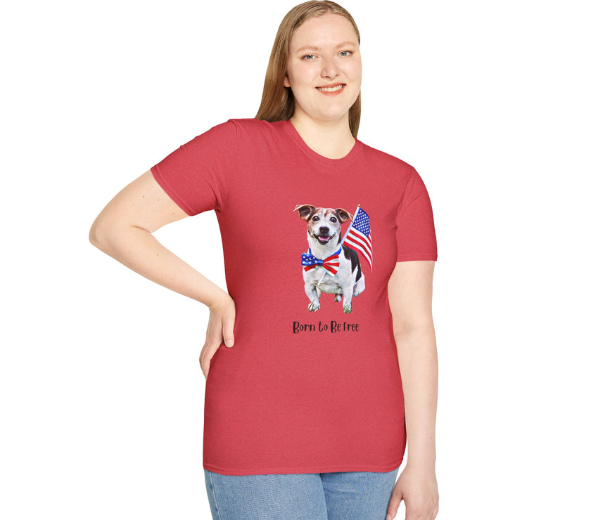 Female wearing T-shirt featuring a cute  puppy wearing an American flag bow tie and holding a small U.S. flag, with the phrase 'Born to Be Free' printed below the image.