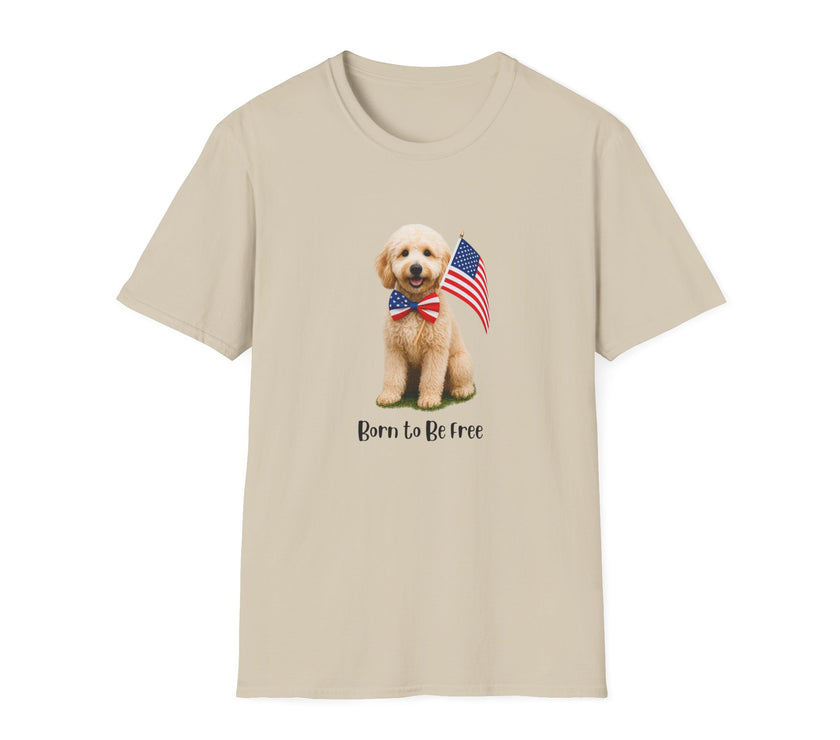 T-shirt featuring a cute golden doodle puppy wearing an American flag bow tie and holding a small U.S. flag, with the phrase 'Born to Be Free' printed below the image.
