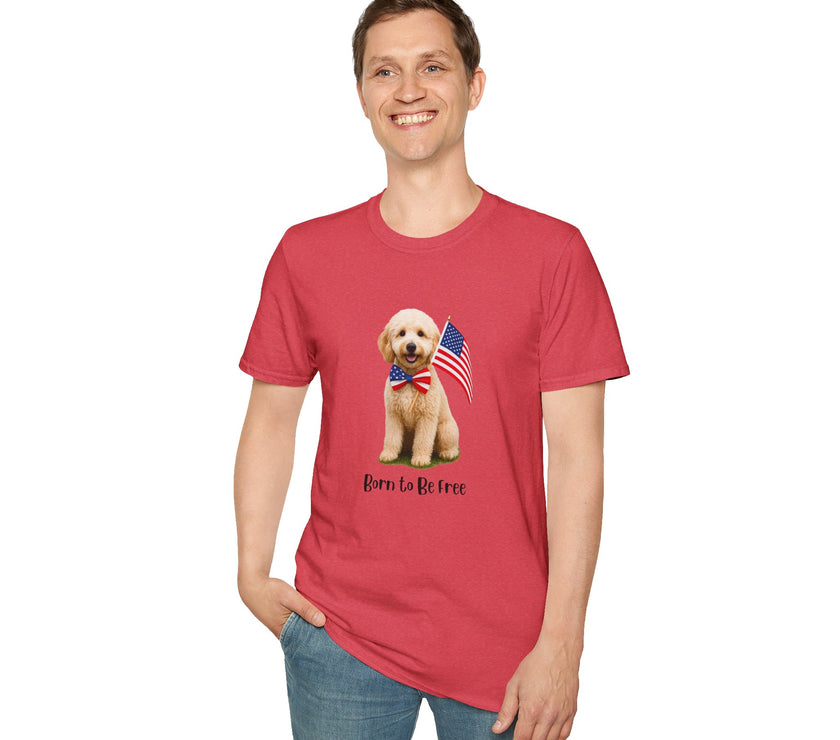 Male wearing T-shirt featuring a cute golden doodle puppy wearing an American flag bow tie and holding a small U.S. flag, with the phrase 'Born to Be Free' printed below the image.