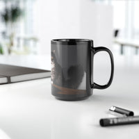 Black ceramic mug featuring a cartoon-style image of a cat sitting at a computer with the funny quote “I work hard so my cat can have a better life.”