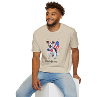 Male wearing T-shirt featuring a cute  puppy wearing an American flag bow tie and holding a small U.S. flag, with the phrase 'Born to Be Free' printed below the image.