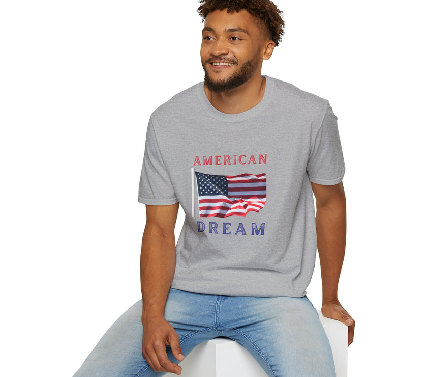 Male wearing T-shirt featuring an American flag graphic with the words 'AMERICAN DREAM' in red and blue text above and below the flag