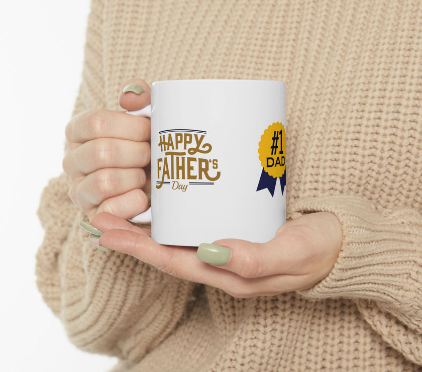 White ceramic mug featuring a #1 Dad ribbon and Happy Father’s Day message, ideal gift for Father’s Day celebrations."