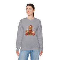 Person wearing a gray sweatshirt with a cat graphic on a white background