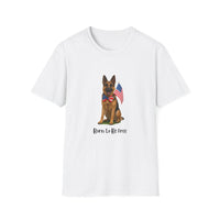 White t-shirt featuring a patriotic German Shepherd wearing an American flag bowtie and holding U.S. flags, with the phrase "Born to Be Free" printed below — perfect for dog lovers and patriotic Americans.