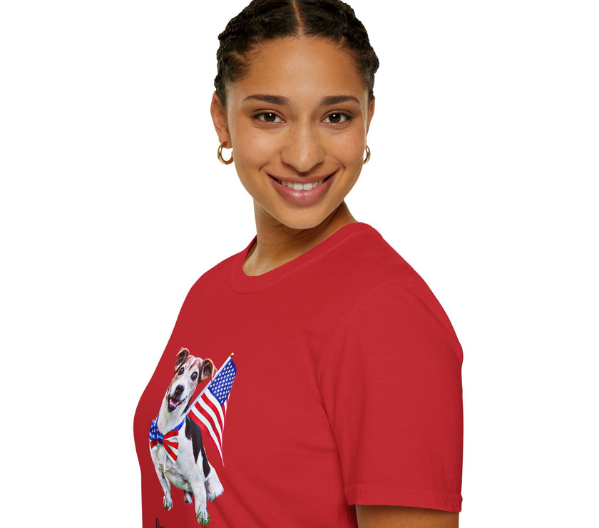 Female wearing T-shirt featuring a cute  puppy wearing an American flag bow tie and holding a small U.S. flag, with the phrase 'Born to Be Free' printed below the image.