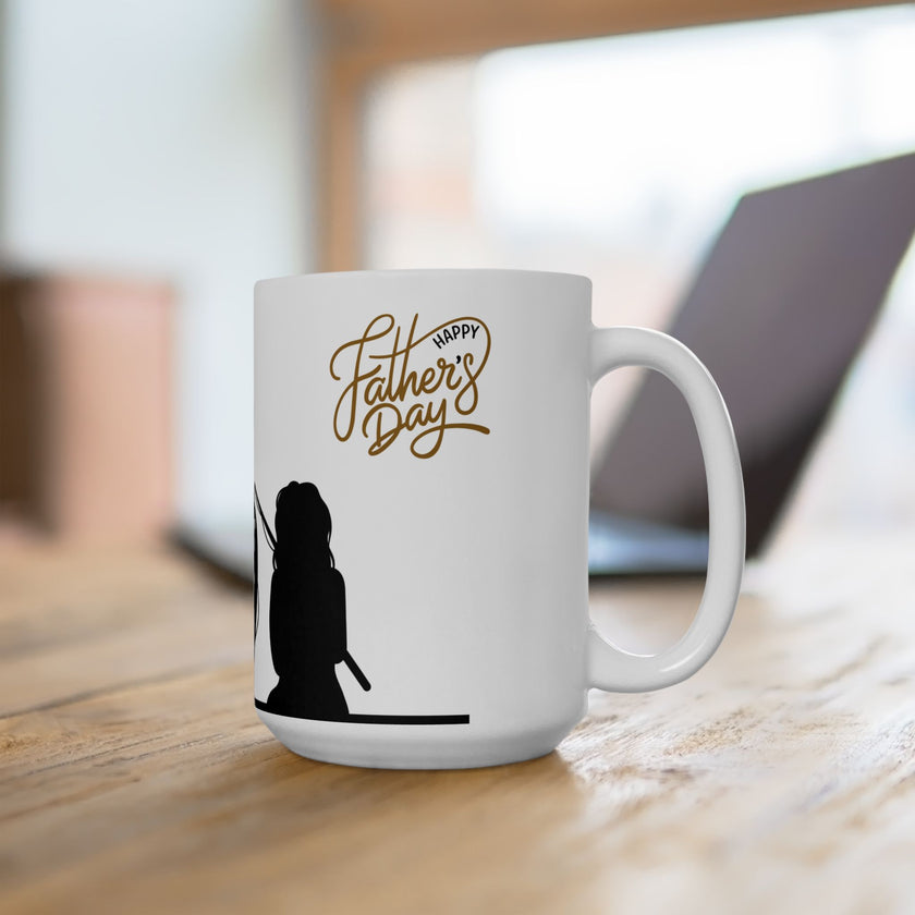 White ceramic mug featuring a silhouette of a child holding a fishing rod next to an adult figure, with the words "Happy Father's Day" in gold script above—an ideal gift for dads who love fishing and family time.