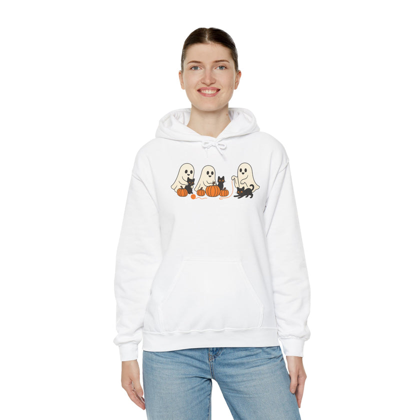 Person wearing a white hoodie with Halloween-themed design on a white background