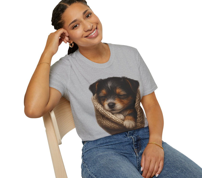 Person wearing a gray t-shirt with a dog graphic on a white background