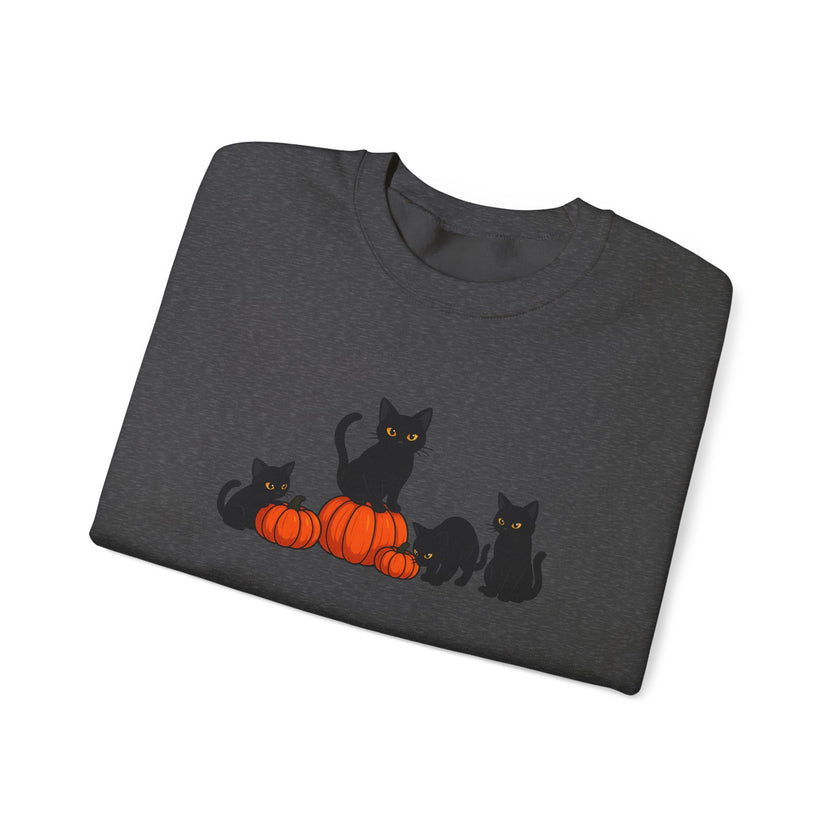 Folded dark gray sweatshirt with black cats and orange pumpkins design on a white background