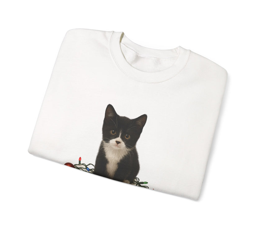 White t-shirt with a black and white kitten design on a white background