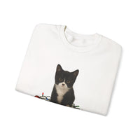 White t-shirt with a black and white kitten design on a white background