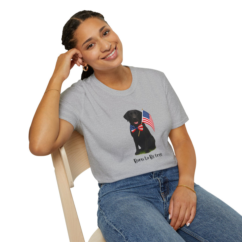 Sport Grrey t-shirt featuring a patriotic Black Lab wearing an American flag bowtie and holding U.S. flags, with the Black Lab phrase "Born to Be Free" printed below — perfect for dog lovers and patriotic Americans.