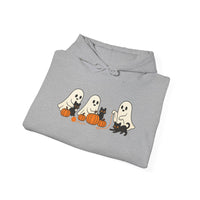 Folded gray hoodie with Halloween-themed design on a white background
