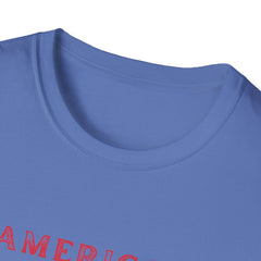  T-shirt (collar view) featuring an American flag graphic with the words 'AMERICAN DREAM' in red and blue text above and below the flag