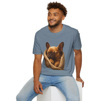 Man wearing a blue t-shirt with a dog graphic on a white background