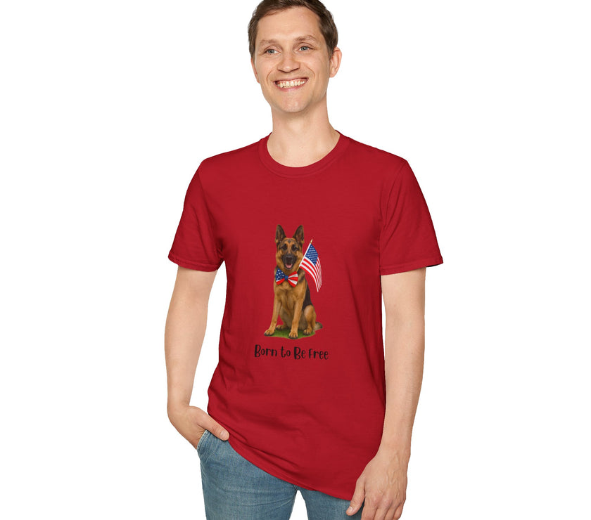 Cherry Red t-shirt featuring a patriotic German Shepherd wearing an American flag bowtie and holding U.S. flags, with the phrase "Born to Be Free" printed below — perfect for dog lovers and patriotic Americans.
