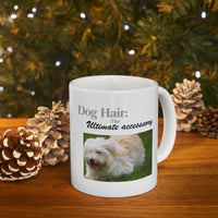 White ceramic mug featuring a photo of dogs lying on grass, with the humorous quote "Dog Hair: The Ultimate Accessory" printed below the image.