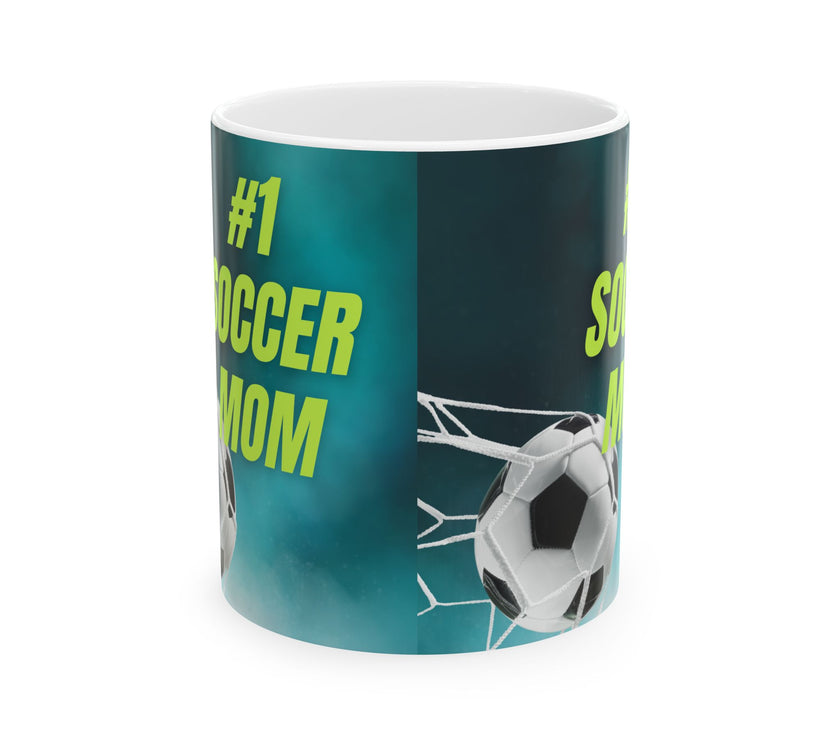 Mug with '#1 Soccer Mom' text and soccer ball design on a teal background