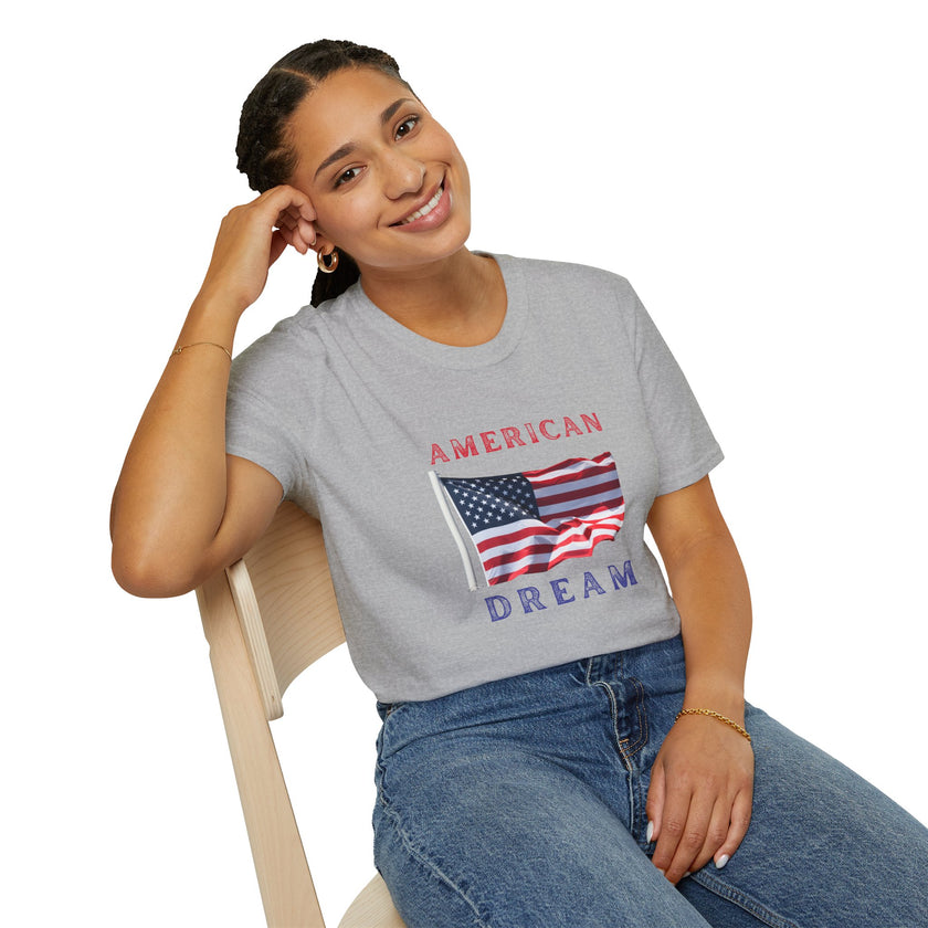 Female wearing T-shirt featuring an American flag graphic with the words 'AMERICAN DREAM' in red and blue text above and below the flag