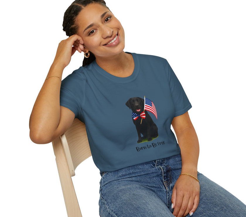 Indigo Blue t-shirt featuring a patriotic Black Lab wearing an American flag bowtie and holding U.S. flags, with the Black Labphrase "Born to Be Free" printed below — perfect for dog lovers and patriotic Americans.