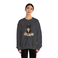 Person wearing a dark gray sweatshirt with a cat graphic and text on a white background