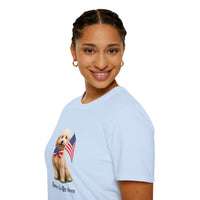 Female wearing T-shirt featuring a cute golden doodle puppy wearing an American flag bow tie and holding a small U.S. flag, with the phrase 'Born to Be Free' printed below the image.