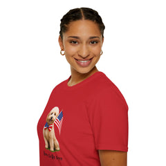Female wearing T-shirt featuring a cute golden doodle puppy wearing an American flag bow tie and holding a small U.S. flag, with the phrase 'Born to Be Free' printed below the image.