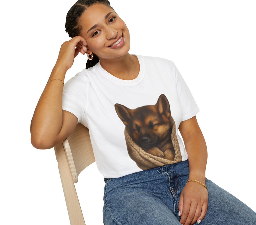 Person wearing a white t-shirt with a dog graphic, sitting on a chair against a white background