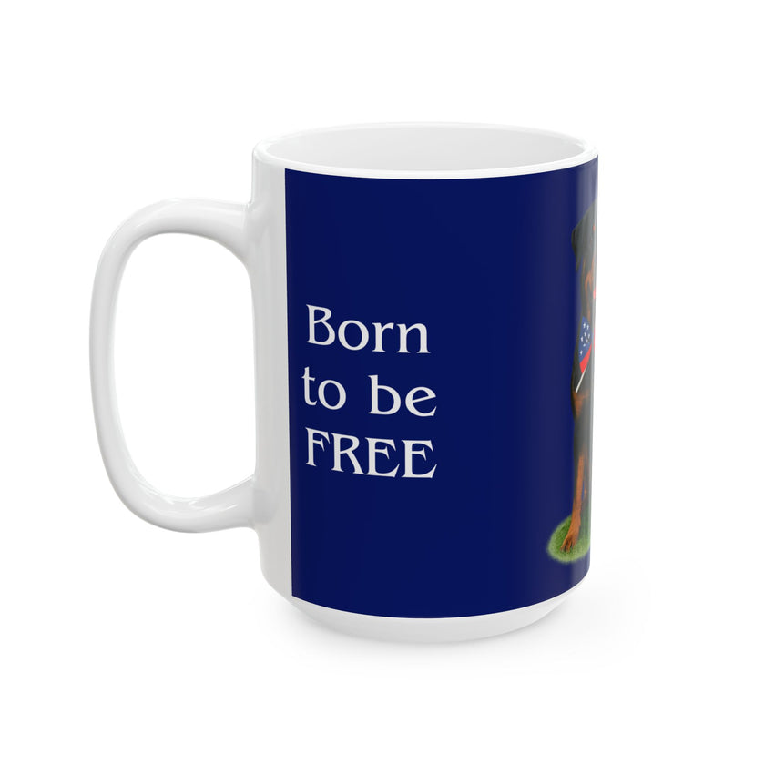 A ceramic mug featuring a Rottweiler sitting on grass, wearing a red, white, and blue bow tie, and holding an American flag against a dark blue background. with the message "Born to be Free"