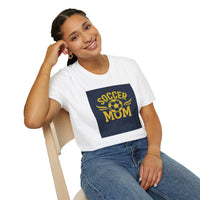 Woman wearing a white t-shirt with 'Soccer Mum' design, sitting on a chair.