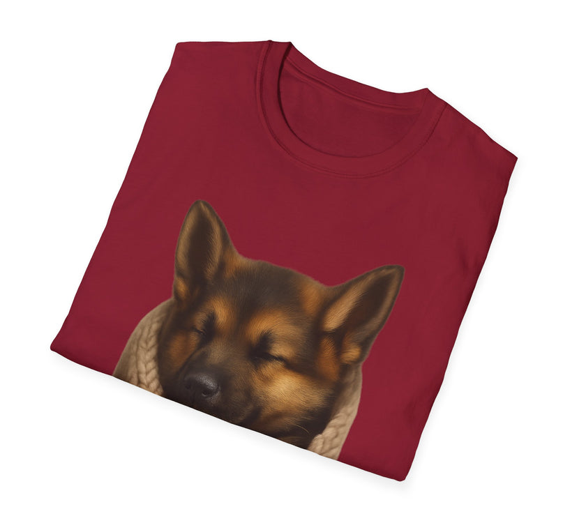 Folded red t-shirt with a dog graphic on a white background