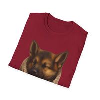 Folded red t-shirt with a dog graphic on a white background