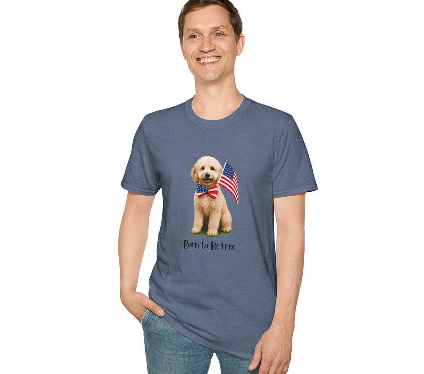 Male wearing T-shirt featuring a cute golden doodle puppy wearing an American flag bow tie and holding a small U.S. flag, with the phrase 'Born to Be Free' printed below the image.