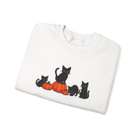 White sweatshirt with black cat and pumpkin design on a white background