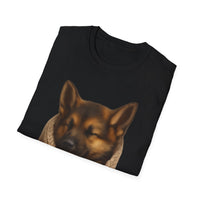 Black t-shirt with a dog's face printed on it, folded on a white background
