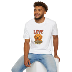 Man wearing a white t-shirt with a dog graphic and text, sitting on a white stool against a white background.