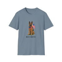 Stone Blue t-shirt featuring a patriotic German Shepherd wearing an American flag bowtie and holding U.S. flags, with the phrase "Born to Be Free" printed below — perfect for dog lovers and patriotic Americans.