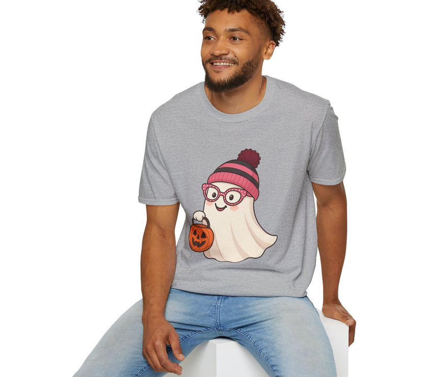 Man wearing a gray t-shirt with a graphic design of a ghost in a hat and glasses holding a pumpkin.