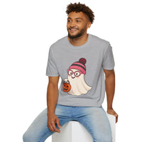 Man wearing a gray t-shirt with a graphic design of a ghost in a hat and glasses holding a pumpkin.